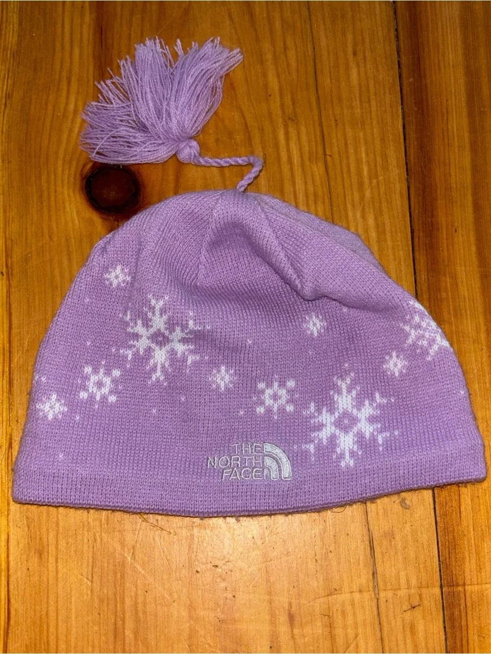 The North Face Purple Snowflake Fleece Lined Tassel Beanie Hat Girls